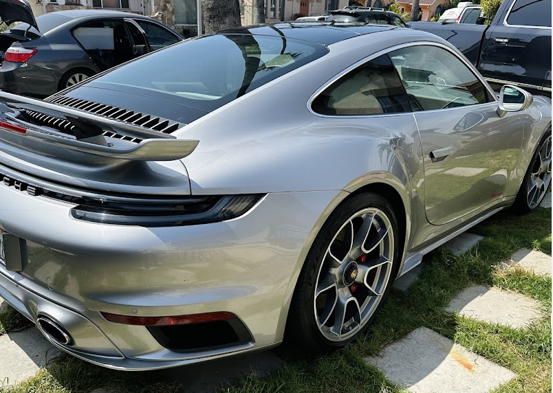 Silver Porsche 911 Turbo rear quarter shining after exterior detailing