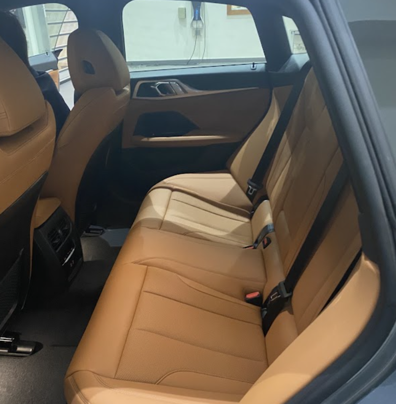 BMW rear bench seats cleaned and conditioned after leather detailing